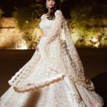 Daisy Shah Instagram - Came for the couple, stayed for the cake. 🧁 . . . Outfit: @nitikagujralofficial Earrings: @shesaidyes.plv_jewellery Potli: @quirkytalesbyrima Mua: @ankkit.malik Hair: @abdul_hairstylist Styled by: @trishadjani 📸: @framefuchsiaphotography . . . #shaadiseason #sanchgothiswali Delhi, India