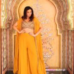 Daisy Shah Instagram - You had me at Yellow. . . . Wearing: @awignaofficial Earrings: @aartie_miranni 💍: @pinklanebyrashi Styled by: @trishadjani 📸: @framefuchsiaphotography . . . #weddingdiaries