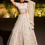Daisy Shah Instagram - Came for the couple, stayed for the cake. 🧁 . . . Outfit: @nitikagujralofficial Earrings: @shesaidyes.plv_jewellery Potli: @quirkytalesbyrima Mua: @ankkit.malik Hair: @abdul_hairstylist Styled by: @trishadjani 📸: @framefuchsiaphotography . . . #shaadiseason #sanchgothiswali Delhi, India