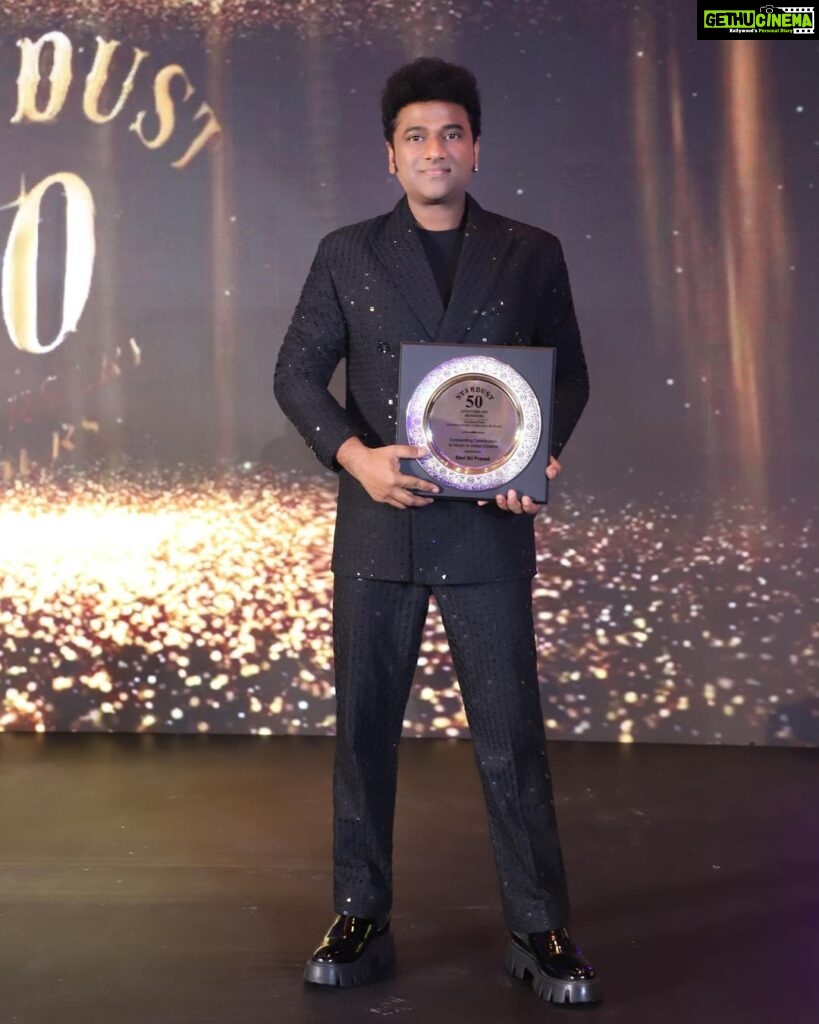 Devi Sri Prasad Instagram - Thank You @stardustmagazineindia for honouring me with the prestigious Award “Outstanding Contribution to Music in Indian Cinema” 🎶🙏🏻 It was a pleasure being at the 50th ANNIVERSARY CELEBRATIONS of STARDUST in Mumbai, with LEGENDS🙏🏻🎶 Wishing U many more Milestone Celebrations & Greater Success forever !🙏🏻 @media.raindrop