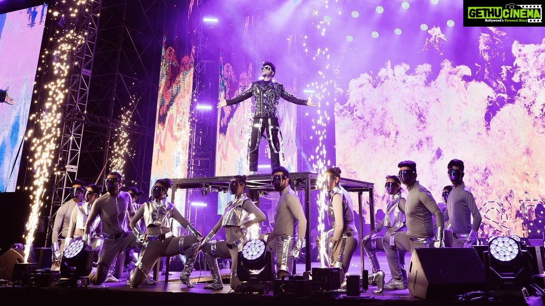 Devi Sri Prasad Instagram - ✨ Witnessing the magnificence of DSP's entry at the concert was an absolute game-changer! 🌟✨ From the moment he stepped on that stage, it was clear that this man knows how to make an entrance like no other. The air was charged with anticipation as the crowd erupted in thunderous applause, and the energy in the room soared to new heights. DSP's presence was electrifying, his charisma captivating, and his passion for music contagious. The atmosphere was nothing short of pure magic as he set the stage on fire with his mesmerizing talent. It was a moment that will forever be etched in our hearts. 🎶❤️ #DSPConcert #EntranceMaster #musicalmagic #oosolriyaoooosolriya Bukit Jalil National Stadium