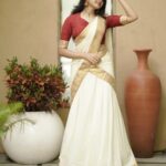 Devika Sanjay Instagram - happy onam!! pictures by @sameeh_photography outfit @nifa_fashions_ make up and hair @aswathivipul @yourlookstudiosclt location @lecandlesresorts jewelry:@kajal_jewellery