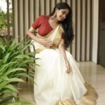 Devika Sanjay Instagram - happy onam!! pictures by @sameeh_photography outfit @nifa_fashions_ make up and hair @aswathivipul @yourlookstudiosclt location @lecandlesresorts jewelry:@kajal_jewellery