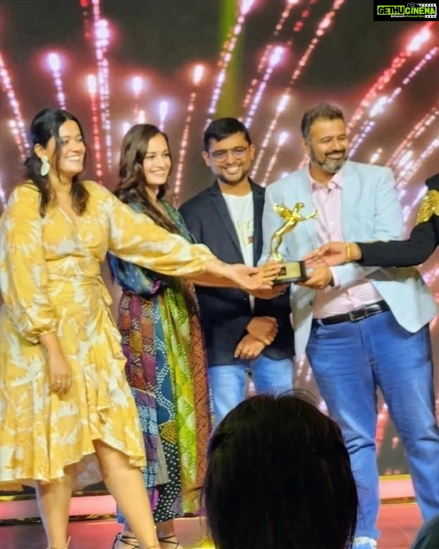 Dia Mirza Instagram - We won! GRAY, our first ever @weareyuvaa x @amazonminitv short film won the Best Short Film Award at the @iwmbuzz Awards tonight. But my favourite part of the evening was getting to collect it alongside @diamirzaofficial, who has been the most gracious actor I have had the privilege of working with. During the pre-production of Gray, we wanted someone truly compassionate to play the pivotal role of the therapist in the film, to talk 'consent'. @sakshirg @puneetruparel & I couldn't think of anyone better than Dia. Within 24 hours of my DM, Dia had read the script, agreed to do it, decided to give her fee to charity, and had the most thoughtful words of feedback on the writing! She then met me and played the sweetest host, diving deep into character and themes of the film, while eager to know more about Yuvaa and my work.. which she's been incredibly supportive of anyway! On set, she was a dream to work with. First to arrive, always humility personified, more calm than all the rest of us not only about her role, but even when any of us needed reassurance about our work too. And as an actor, I have rarely come across such grace, composure and generosity on camera. Oftentimes, I have struggled to find people who are great at their work but also kind, earnest and grounded about it, especially when they reach a certain stature. I have always believed you can have talent - and success - without being an asshole. And working with Dia, I couldn't stop being in awe of how she's proof that this is possible! She's the kind of person I hope to someday be, if I ever reach her level of success & impact (especially with all the AMAZING work she does on climate change with the UN & the SDGs!). This year, I tried making a promise to myself that I'm going to be more measured on social media and not make too many fanboy posts about folks I admire (sometimes, they end up not nice 💔). But honestly, each time I get the opportunity to hang with Dia, it feels so wholesome, honest and real, I just couldn't stop myself from writing ❤️ Thank you for being who you are, Dia. You truly do make the world a better place ☺️🤗 All others: do watch our film GRAY on @amazonminitv for FREE!