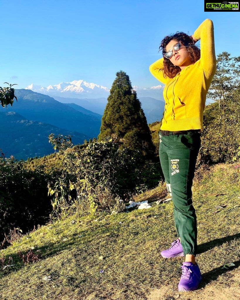 Ditipriya Roy Instagram - Our peace shall stand as firm as Rocky Mountains……..🏔♥️ . . . . . . . . . . #mountains #autumn #autumnvibes #sunshine #colourpop #bright #nature #naturelover #curlyhair #messyhair #mood #positivevibes #soulsearching #love #peace #instalike #instamoment #instamood