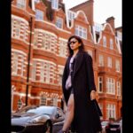 Dushara Vijayan Instagram - I’m a vibe that you can’t handle🖤 . . . Shot by : @georgesimon_m Bag : @prada Hairstylist : @renuka_mua #streetphotography #fashionblogger #fashionista #devilwearsprada #prada #black #style #styleblogger #styleinspo #fashionstyle #london #luxury