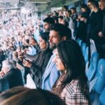 Farhan Akhtar Instagram - An evening to remember. The atmosphere was electric..!! And to watch my team dominate RM and score 4 .. WHAT A TREAT..!! 🔥🔥 Now for the final. Let’s go #mancity .. let’s bring her home 👊🏽🏆 Thank you @etihad .. thank you @mancity for hosting us. Big big hug to your team who were absolutely incredible. Images @sebporter 🙏🏽♥️ Overcoat @sshomme Shoes @dmodotofficial