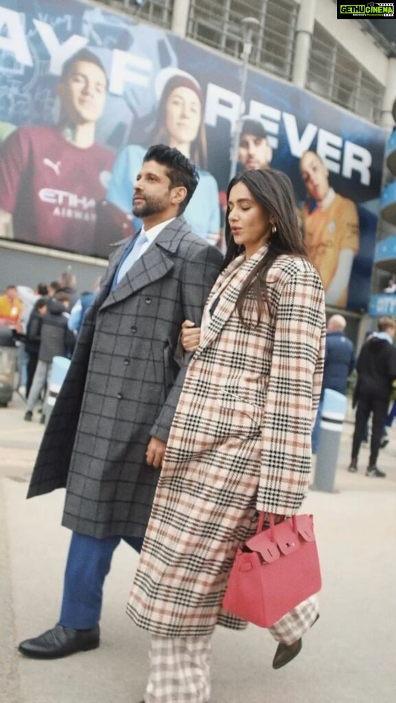 Farhan Akhtar Instagram - From an amazing onboard journey with @etihad ✈️ to exhilarating moments at the Etihad Stadium and celebrating ManCity’s stunning victory over Real Madrid, our hearts are still racing! Istanbul, brace yourself – we’re coming for you! 🌟🔵🔥 #etihad #mancity @mancity @lamiaabbas @sebporter @aishwaryan93 outfit by @goyalkanika @kanikagoyallabel Farhan wearing Coat @sshomme Shoes @dmodotofficial