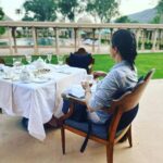 Gul Panag Instagram - The last few weeks have been beyond hectic, and I’m truly grateful that my work has had me doing very diverse things from speaker engagements to brand promotions, promoting running with sewa, to my acting assignments and more. But it has meant a lot of travel. And the pressure of juggling my personal and professional life has taken a toll. So I was delighted when @amanbagh invited me to spend a the weekend with them. This is just what the 3 of us needed. Quality time as a family. Unwinding and relaxing. 260 odd kilometres from Delhi, depending on where in NCR one is, is the stunning Aman Bagh. The journey takes about 4 hours- most of it on 6 lane highways first the EPE/WPE and then the newly inaugurated Delhi Vadodara Highway. The car was on cruise control for 3 hours! At Dausa, one gets on to the State Highway and 45 min later is Aman Bagh. The perfect weekend getaway!! Nestled in a narrow valley in the Aravallis and in the buffer zone of the Sariska National park, Aman Bagh is a beautiful property! A quick cup of tea in the courtyard and we went to our lovely room featuring a pool. Nihal was super excited, both at the sight of the pool and with the lagurs lounging near by. Dinner was back in the courtyard with live music - Rajasthani folk of course! The stars, the date trees and the silhouette of the Aravalis , made for a beautiful evening. #weekendvibes #minibreak #weekendgetaway @amanbagh #amanbagh #AmanResorts #thespiritofaman Amanbagh