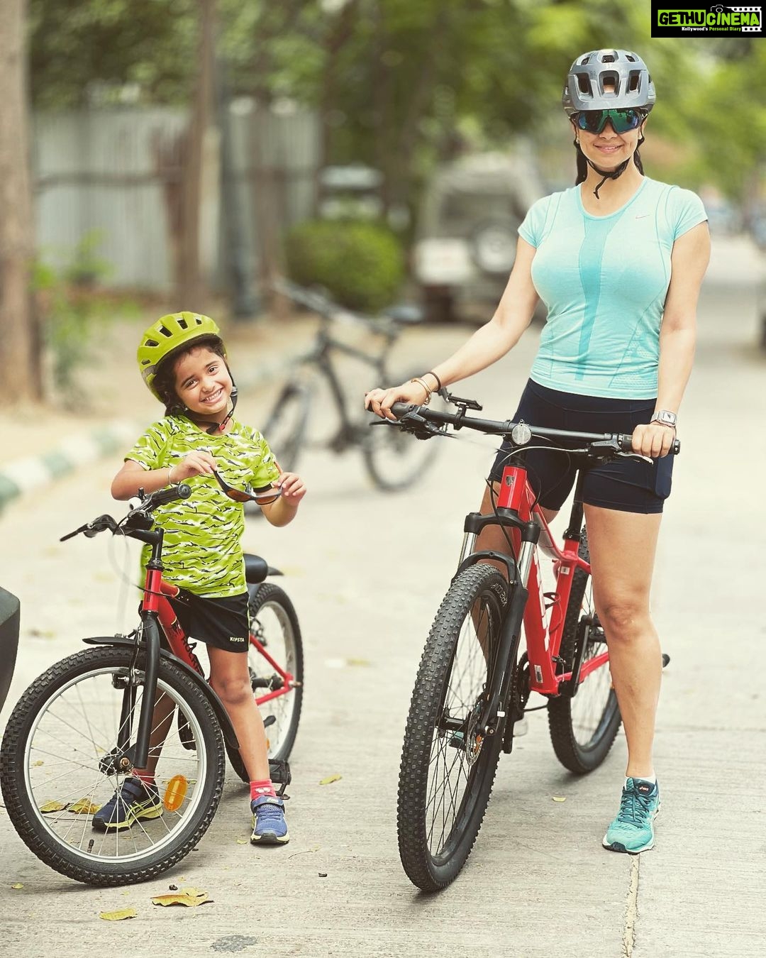 Gul Panag Instagram - Our Sunday rides are becoming more fun. Nihal has graduated to a bigger bike and has been off training wheels for over 18 months. He is now becoming a full fledged member of the crew! Today he wanted to ride in ‘arrow’ formation, ahead of his Mom and Dad. 💁🏻♀️ And he’s becoming faster. I can no longer go running with him like I used to , as I just can’t keep up. Recently , on a 5 km run, while I ran ( out of breath perpetually), he rode along with me on his bike. Or rather ahead. And I HAD to keep up- to be there by his side as negotiated riding on a road with other vehicles ( however few)! That day by having to run with him ( albeit after a short break in my own regimen), I was struggling to keep up, and finally had my lungs at bursting point. But managed to do the distance in 25 minutes. The fastest I’ve been, in over a decade! And no it wasn’t fun.🤦🏻♀️ That was the day I decided I would ride with him instead. Yes, I have to ride slow. My bikes ( both the MTB and the Hybrid) are faster by virtue of wheel size and gears. But it’s easier than trying to up keep with him on a bike while I run. Also, yet another affirmation of the fact that THEY DO AS YOU DO. NOT AS YOU SAY. So I try and do the things I enjoy, with him in tow, while constantly striving to be a role model for him. #weekend #ride #bike #cycling