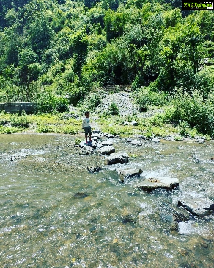 Gul Panag Instagram - Every trip to the outdoors makes Nihal braver . He is more open to taking risks and trying new things. A part of me wants to hold him back and protect him. But I realise that in doing so, Iβm only coming in the way. So I hang around letting him do his thing, will being close enough to rush to him should the need arise! He started out, not wanting to go anywhere close to the stream. Then not even wanting to come onto the first rock. Swipe to see him doing his own thing, in a short while. ππ»ββοΈππ»ββοΈ Video 1 me showing him Video 2 me helping him Video 3 me guiding him Video 4 him doing his thing ( brief emergence of Momzilla as he slipped, but I recovered, as quickly as he did.π
Video 5 Heβs on his own- almost . And wants to do it again and again. Quite a journey from not anting to come near water 15 minutes ago!! @simranpotnis thank you for the photo and hospitality.