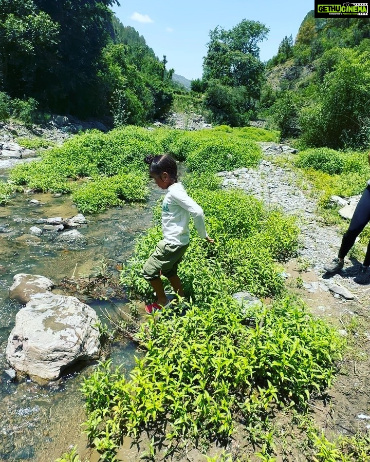 Gul Panag Instagram - Every trip to the outdoors makes Nihal braver . He is more open to taking risks and trying new things. A part of me wants to hold him back and protect him. But I realise that in doing so, Iβm only coming in the way. So I hang around letting him do his thing, will being close enough to rush to him should the need arise! He started out, not wanting to go anywhere close to the stream. Then not even wanting to come onto the first rock. Swipe to see him doing his own thing, in a short while. ππ»ββοΈππ»ββοΈ Video 1 me showing him Video 2 me helping him Video 3 me guiding him Video 4 him doing his thing ( brief emergence of Momzilla as he slipped, but I recovered, as quickly as he did.π
Video 5 Heβs on his own- almost . And wants to do it again and again. Quite a journey from not anting to come near water 15 minutes ago!! @simranpotnis thank you for the photo and hospitality.