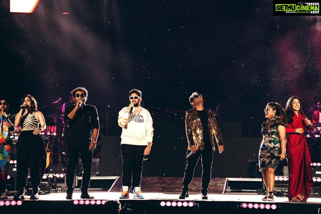 Haricharan Instagram - These are some amazing Pictures by @vengka_desh at the Recent concert in Kuala Lumpur with ARR sir. Always an Honour! Icing on the cake was sharing the stage with the super cute @ctdk , indeed an experience to Perform ‘Munbe Vaa’ with her. Grooving and Vibing with my Buddies on stage with another 72,000 of you malaysia. Etched in my Mind #dmy #arrahman #malaysia #haricharan