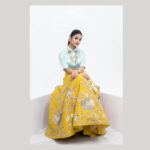 Ivana Instagram - An exquisite fit for the fashion-forward bride! @savinidii_official 💙💛 Kickstart the wedding festivities and charm your guests with our scintillating pastel satin shirt and silk lehenga set! This captivating combo carries hand-embroidered floral detailing and works as the ideal choice for your pre-wedding Mehndi party! Outfit & Styling @savinidii_official @eega_praveen Inframe @i__ivana_ Shot by @crackjackphotography @jenovin Makeup @b3bridalstudio Jewellery @mspinkpantherjewel Hairdo @hair_by_aiswaryaraj Location @savinidii_official For enquiries, kindly contact us: 9585455055, 9786455055; or email us at savinidii2020@gmail.com • . . . #satinshirt #handembroidery #savinidiibride #satin #pastelshirt #bridalwear #lehenga #savinidii #bride #fashion #wedding #bridallehengas #bridal #southindianweddings #bridetobe #onlineshopping #bridallehenga #ethnicwear #designer #weddinginspiration #designerwear #bridalfashion #bridaldress #lehengacholi #fashiondesigner #intricatedesign #lehengas #chennaidesigner #southindianbride