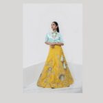 Ivana Instagram - An exquisite fit for the fashion-forward bride! @savinidii_official 💙💛 Kickstart the wedding festivities and charm your guests with our scintillating pastel satin shirt and silk lehenga set! This captivating combo carries hand-embroidered floral detailing and works as the ideal choice for your pre-wedding Mehndi party! Outfit & Styling @savinidii_official @eega_praveen Inframe @i__ivana_ Shot by @crackjackphotography @jenovin Makeup @b3bridalstudio Jewellery @mspinkpantherjewel Hairdo @hair_by_aiswaryaraj Location @savinidii_official For enquiries, kindly contact us: 9585455055, 9786455055; or email us at savinidii2020@gmail.com • . . . #satinshirt #handembroidery #savinidiibride #satin #pastelshirt #bridalwear #lehenga #savinidii #bride #fashion #wedding #bridallehengas #bridal #southindianweddings #bridetobe #onlineshopping #bridallehenga #ethnicwear #designer #weddinginspiration #designerwear #bridalfashion #bridaldress #lehengacholi #fashiondesigner #intricatedesign #lehengas #chennaidesigner #southindianbride
