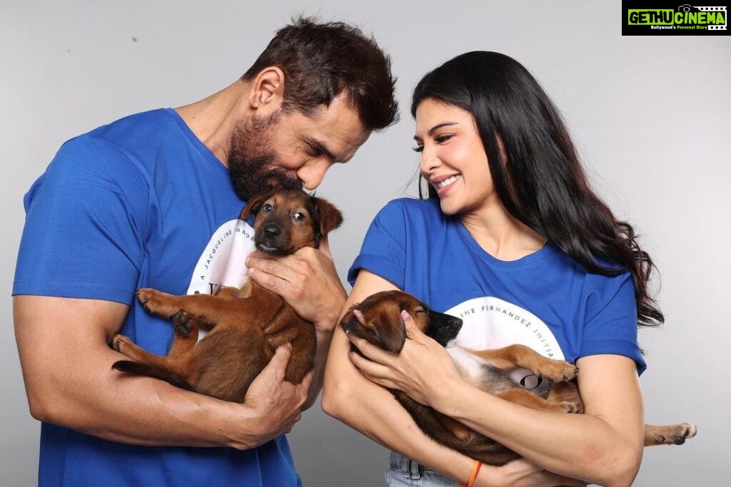 Jacqueline Fernandez Instagram - @jf.yolofoundation is so happy to have @thejohnabraham (thank you John!!) on board for Yolo for Animals!! An initiative to help stray animals with sterilisation and adoption! 🙏🙏 stay tuned for more updates on how you can help too!! 💙💙💙 thank you @mitalisboardandtrain for the cutest Zhandu and Rasgulla today, we have seriously fallen in love with them!!!