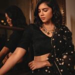 Kalyani Priyadarshan Instagram – Currently obsessed with the vibe of summer blacks 🖤

📸: @merin__georg