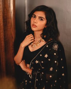 Kalyani Priyadarshan Instagram - Currently obsessed with the vibe of summer blacks 🖤

📸: @merin__georg