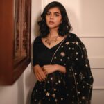 Kalyani Priyadarshan Instagram – Currently obsessed with the vibe of summer blacks 🖤

📸: @merin__georg