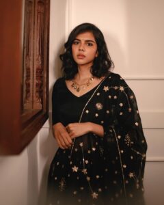Kalyani Priyadarshan Instagram - Currently obsessed with the vibe of summer blacks 🖤

📸: @merin__georg
