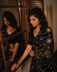 Kalyani Priyadarshan Instagram - Currently obsessed with the vibe of summer blacks 🖤 📸: @merin__georg
