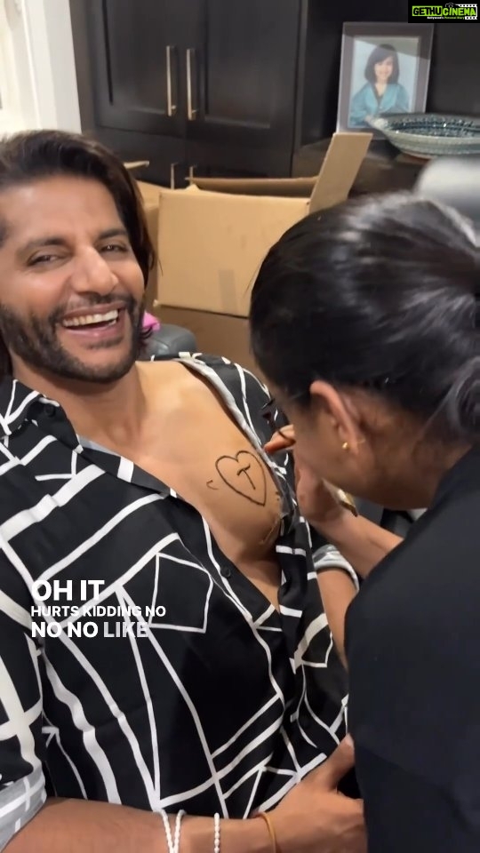 Karanvir Bohra Instagram - Another day, another wedding function! 😄 Mendhi night.. getting her name written on my chest. She got mendhi done afterwards.. I have one question though.. who is this X? 😠 @bombaysunshine