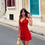 Karishma Sharma Instagram - Traveling and exploring new places can be a great way to broaden your horizons, learn about different cultures, and gain new experiences. Malta is a beautiful country with a rich history and many interesting places to visit. It’s great that I enjoy walking around and exploring the colorful buildings with balconies - this is a great way to soak in the local atmosphere and appreciate the architecture. I wanna keep on traveling and exploring, and may my soul continue to be filled with happiness and joy! Boots @alohas Jewelleery by @bloome.in