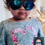 Lakshmy Ramakrishnan Instagram – Our kids make fun of my craze for sun shades and here you go! This little one has taken after me, we did this over a video call today, as early as 6 am 😁
Every time we went into a mall, Ashwin pulled me away from Sun glass hut, I am waiting to see what he will do when this cutie does it! action replay? 😎❤️