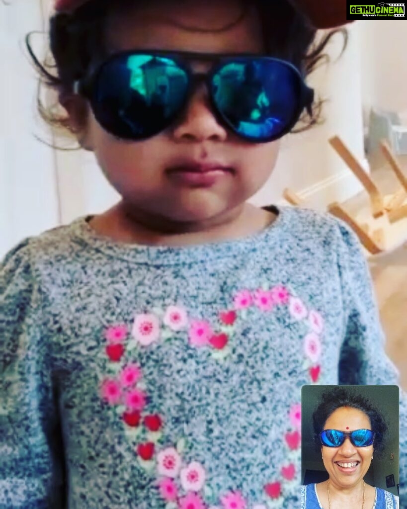 Lakshmy Ramakrishnan Instagram - Our kids make fun of my craze for sun shades and here you go! This little one has taken after me, we did this over a video call today, as early as 6 am 😁 Every time we went into a mall, Ashwin pulled me away from Sun glass hut, I am waiting to see what he will do when this cutie does it! action replay? 😎❤️