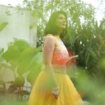 Leona Lishoy Instagram - Wearing Kahani’s newest bridal lehenga from the latest collection NOOR. This eye catchy canary yellow lehenga is highlighted with cutwork waist band and paired with a strapless bustier and hand embroidered sleeveless shrug. The beautiful detailing in the luxurious floral motif designs on the shrug/crop top and the pleated skirt make this a perfect bridal attire for a contemporary bride. Video - @nostalgiaevents.in Costume - @kahani_stories_in_thread MUAH - @merins_remyamerin Jewellery- @meralda.jewels Location - @portmuziriskochi For enquiries, please Call or WhatsApp us on +918138008077 #kahani #storytellers #storiesinthread #clothingbrand #indianclothing #ethnic #indowestern #dresses #embroidery #besfestiveready #aditiravi #leonalishoy #noor #newcollection #bridesofindia #kahanibrides #wedding #weddingpret #winter #instagood #reels #reelsinstagram #reelitfeelit