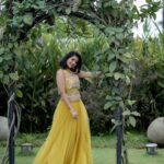 Leona Lishoy Instagram - Here’s to finding a ray of sunshine in everything around! Wearing this beautiful canary yellow lehenga by @kahani_stories_in_thread 💛 Photography - @nostalgiaevents.in Costume - @kahani_stories_in_thread MUAH - @merins_remyamerin Jewellery- @meralda.jewels Location - @portmuziriskochi #kahani #storytellers #storiesinthread #clothingbrand #indianclothing #ethnic #indowestern #dresses #embroidery #besfestiveready #aditiravi #leonalishoy #noor #newcollection #bridesofindia #kahanibrides #wedding #weddingpret #winter #instagood