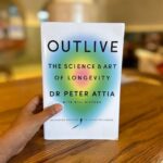 Lisa Ray Instagram – ‘One of the main obstacles in anyone’s quest for longevity is the fact that the skills that my colleagues and I acquired during our medical training have proved far more effective against fast death than slow death.’

Think about this statement. 

Now reading this remarkable book. I’m in what you call mid-life, living with a potent disease – keeping the beast in the cage as we say in the Multiple Myeloma community- and while ideologically and spiritually I believe I will be hanging around Samsara for a few more turns of the wheel, I know, in this present body, I won’t last forever. (Nor do I want to) 
But- but!- I know I want to live well, be healthy, strong, coherent, capable of tying my laces and better able to prance along as long as possible.

This book by #DrPeterAttia is a lifetime of radical and revolutionary insights condensed into a very compelling read. He goes to the origins of disease and chronic conditions that seems to be the hallmark of our modern lifestyles. “In Outlive, Peter Attia explores the science of not just prolonging life, but also prolonging aliveness.”

Doc Peter comes across as a learned adventurer, challenging the norms of the medical industry, and let’s face it, you have to be a bad ass to take on the status quo. While the tone of this book can be perceived as sinewy and data driven, it doesn’t make it less valid for someone like myself who favours instinct and a more feminine reading of crisis : I’ve learned to embrace any approach towards health that has intentionality even if it diverges from my way. There’s a lot if wisdom here. 

I’m all in. Cheers to improving my overall Healthspan ; how well you life rather than how long. 

I’ll leave you with this: 

‘There comes a point where we need to stop just pulling people out of the river. We need to go upstream and find put why they’re falling in.’
– Bishop Desmond Tutu

Thanks @penguinindia for sending this over.

@peterattiamd #Outlive