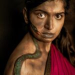 Lisha Chinnu Instagram - Happy Halloween 🎃 !!! Celebrating d Indian Halloween... . Indian Mythical Nag women Start by drawing the outline of the snake, start adding black and using finger add cream green metallic eyeshadow to give a 3D dimension, eyes and young for the snake,dab little with the mixture of black brown shadow to create rustic look and finally add a fake tooth to finish the look. Muah @arte_makeup_academy @joline_mua 📷 @sinty_boy #Indian #indiahalloween #halloweenmakeup #villagegirl #ghostphotoshoot #ghost #lishachinnu #model #actress #entrepreneurlife #cirkleprandevents #livelife #musiclover🎶