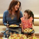 Mahhi Vij Instagram - My heart overflowed with pure joy of motherhood long before I held my biological child. It all began when Khushi and Rajveer opened their arms and welcomed me into their lives, four whole years, before Tara happened. I feel so lucky when I see them cuddled up in bed to hear bedtime stories, listen to Rajveer's cues while shooting a reel, watching Tara apply make-up on Khushi and always taking each others side. 😍 This Mother's Day, we celebrated our love by sharing (and fighting over) a shaandaar daawat from @behrouzbiryani. Looking at them savouring the flavours of royal biryanis, kebabs and Tara’s favourite “gulaabjamoooon”, it filled my heart like never before. Aur kisi ne bilkul sahi kaha hai, "A family that eats together, stays together!" 👑 Happy Mother's Day, moms! ✨ #behrouzbiryani #behrouz #mothersday #celebration #biryani #love