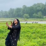 Malavika Krishnadas Instagram - Watch the full video on my YouTube channel. #linkinbio This was a totally unexpected on-spot choreo which was taken almost 2 hours back. Allright ,time for me to fess up🙆‍♀️... Todays' schedule actually was to shoot an Independence dance choreo for you all with a proper dslr, unfortunately it couldnt go ahead as planned today because of the severe weather and rain. I was kinda fustrated and moody all dayy coz of this but then I thought why not a rain dance and make use of the weather conditions😂. So I took off with my cousin into the fields🌩️ to shoot a sudden on-spot choreo for this wonderful song and get drenched.( currently nursing my legs with saltwater for cleansing the dirt🤒) Getting drenched was fun and worth the shot but please do PARDON the flaws and technical errors as I am not at all used to dance in these conditions and it was shot on my phone🥺. I really really wish I could have made it better🤕 but I really hope you enjoy this video🥶. @pooja.murali.31 ❤️ . #barsoremegha #raindance #rain #ottapalam #kerala #peace #peacock #love