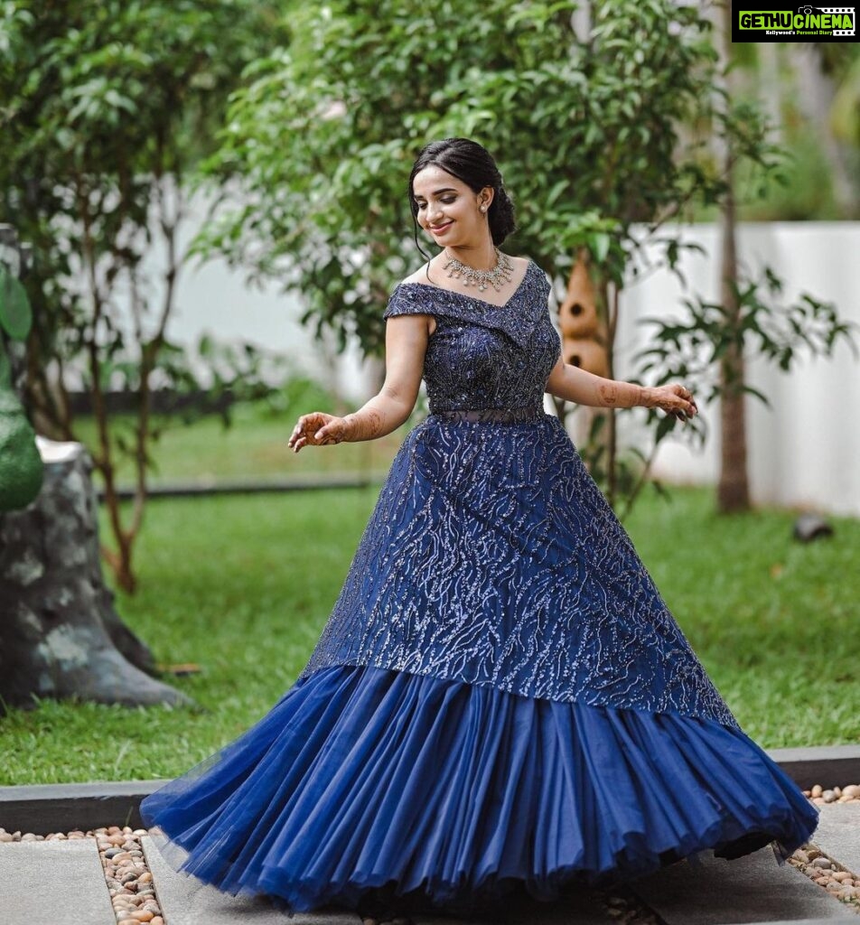 Malavika Krishnadas Instagram - 2 years ago , back when I used to day dream about my wedding outfits, even then I was adamant that my reception attire must be a midnight blue gown. Hence that was the only request I had put forward to Amitha chechi @aatmabyamitha before designing the gown. She made my wedding dream come true and touch a full circle into making my day super special❤️🫶, cant thank you enough for this beauty. Your Super happy Customer🫶.