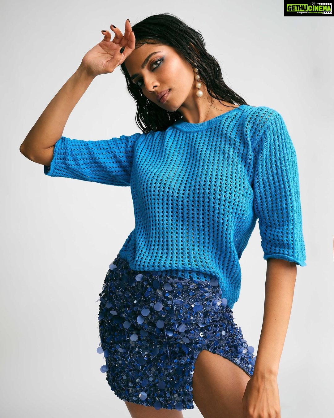Malavika Mohanan Instagram - Of blues & miu mius 💙🦋💙 📸 @nehachandrakant Assisted by (Photography) @avinash78ni Styled by @vrindaanarang Assisted by (Styling) @kalyaniadhxv @imranshaikh_official Makeup @sonamdoesmakeup Hair @hairstylist_madhav2.0 Assisted by (Hair) @gulshan_geloth PR @theitembomb Skirt @dhruvkapoor Top @lovebirds.studio Shoes @miumiu at @myalmari_