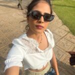 Malavika Mohanan Instagram - When I got a day off after 30 days of continuous shoot and also saw my parents after 30 days of being away from home 👨‍👩‍👧 We went to a cliffside at Varkala, had a mini picnic, saw the beautiful sea and a gorgeous sunset and came back home 🥰 (hotel is home at the moment 🤷🏻‍♀️ ) Oh, and also twinned with senior Mohanan 🐰🐰 @adityamohanan you were missed. Only a little though 💩