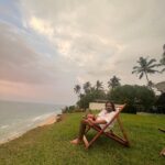 Malavika Mohanan Instagram - When I got a day off after 30 days of continuous shoot and also saw my parents after 30 days of being away from home 👨‍👩‍👧 We went to a cliffside at Varkala, had a mini picnic, saw the beautiful sea and a gorgeous sunset and came back home 🥰 (hotel is home at the moment 🤷🏻‍♀️ ) Oh, and also twinned with senior Mohanan 🐰🐰 @adityamohanan you were missed. Only a little though 💩