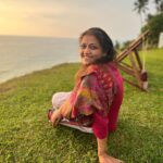 Malavika Mohanan Instagram - When I got a day off after 30 days of continuous shoot and also saw my parents after 30 days of being away from home 👨‍👩‍👧 We went to a cliffside at Varkala, had a mini picnic, saw the beautiful sea and a gorgeous sunset and came back home 🥰 (hotel is home at the moment 🤷🏻‍♀️ ) Oh, and also twinned with senior Mohanan 🐰🐰 @adityamohanan you were missed. Only a little though 💩