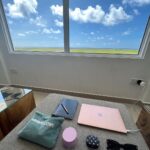 Malavika Mohanan Instagram - When you’re constantly on the move 24X7 so your makeshift office looks like this on some days ☁️ Can’t complain about this lovely view overlooking the ‘Maamigili’ airport runway and the magnificent blue sea in Maldives though 🌊 Maamigili is known for whale sharks and I saw a lot of boats hovering around right in front of me at this very view while I was shooting as they’d spotted a shark there and I so badly wanted to see one too but next time! 🐳 #WorkGypsyLife #🐳SharkFomo Maamigili, Maldives