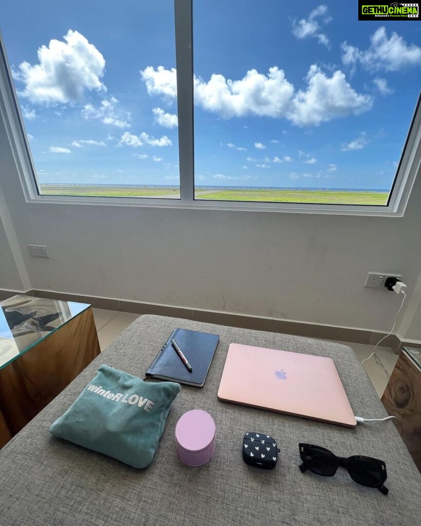 Malavika Mohanan Instagram - When you’re constantly on the move 24X7 so your makeshift office looks like this on some days ☁️ Can’t complain about this lovely view overlooking the ‘Maamigili’ airport runway and the magnificent blue sea in Maldives though 🌊 Maamigili is known for whale sharks and I saw a lot of boats hovering around right in front of me at this very view while I was shooting as they’d spotted a shark there and I so badly wanted to see one too but next time! 🐳 #WorkGypsyLife #🐳SharkFomo Maamigili, Maldives