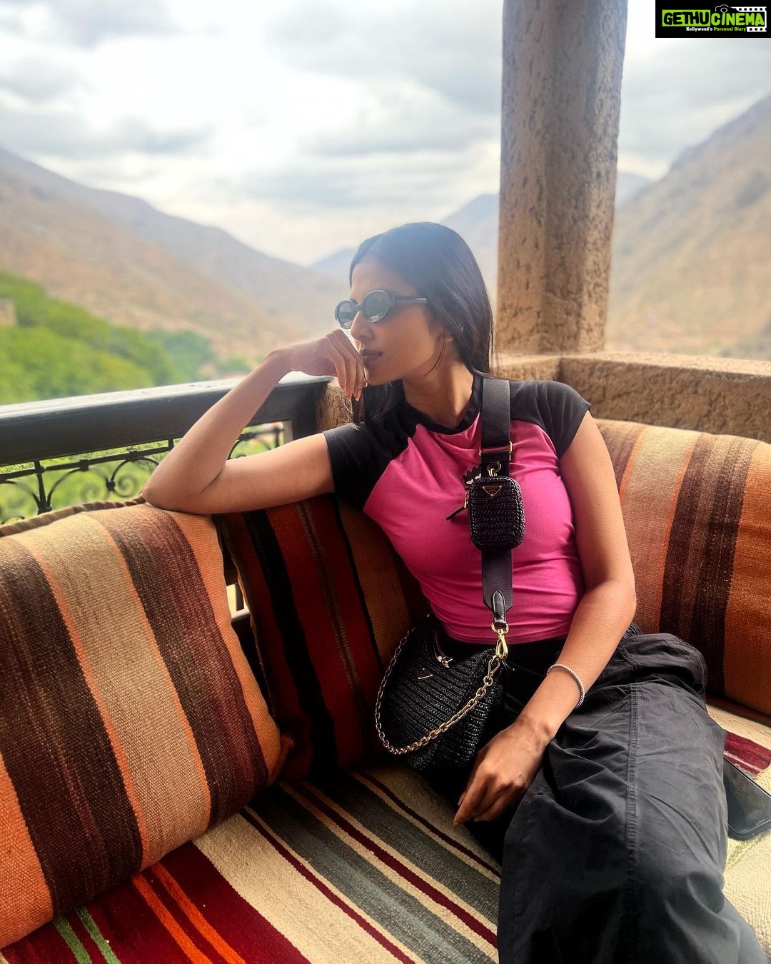 Malavika Mohanan Instagram - Highlights of yesterday- •A lovely hike at the foothills of the highest peak in North Africa 🏔 •Stopping for lunch at this stunningly scenic mountain retreat ‘Kasbah du Toubkal’ which is popularly regarded as one of the most beautiful retreats in the world 🍛 •So many pretty wild roses everywhere 🌹 •Picking fresh(and the sweetest) cherries from a cherry farm on our way down the hill and nomnom-ing to my heart’s content 🍒 It was a good day ♥️