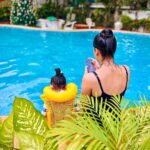 Malti Chahar Instagram - First swimming lesson🏊🏻‍♀️ but my student refused to enter the pool😂 so we both sat along the pool and chilled!💛 Maasi loves you Aadu😘 Pic credit- @surabhi.2210 mommy paparazzi #swimmingpool #swimming #love #cute #pic