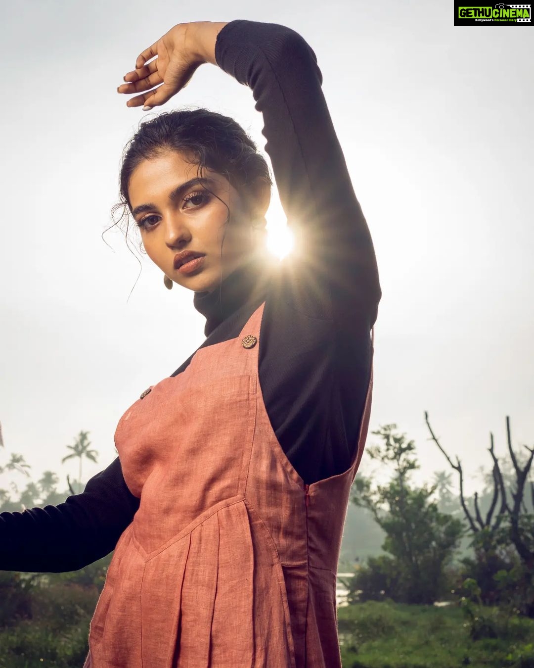 Mamitha Baiju Instagram - "The sun dreams palely down unfocused, distracted ray." In frame: @mamitha_baiju Photography: @george_kutty_k.l Designing & Styling:@hema_pillai_ Hair & makeup: @anjali__makeup_artist Cinematography: @sixty7frames Camera associates: @pramod_s_sasi @josephfrancis___