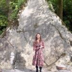 Manjari Fadnnis Instagram - That’s the Ironing Stone, or The Giants Wishing Stone, at Kylemore Abby. They say if u stand with your back against the stone, make a wish & throw a small pebble over the stone 3 times, that wish will be granted… It’s supposed to be bad luck if u wish for money, but u can wish for love ❤️ So the legend goes like this …… 2 or Ireland’s best known mythological heroes, Cu Chulainn & Fionn McCool, described in local lore as giants who fought each other on the Connemara Mountain Tops, were hot tempered & didn’t see eye to eye… During one of their heated arguments Cu picked up a massive stone & threw it towards Fionn. It narrowly missed him & landed at an unusual angle at Kylemore Estate. The shape of the stone resembles a traditional iron used for ironing clothes. It’s locally known as the Ironing Stone or the Smoothing Iron. #kylemoreabbey #theironingstone #travel #forklore #ireland #clifden #solotravel #makeawish #goofy Kylemore Abbey, Connemara, Irelan