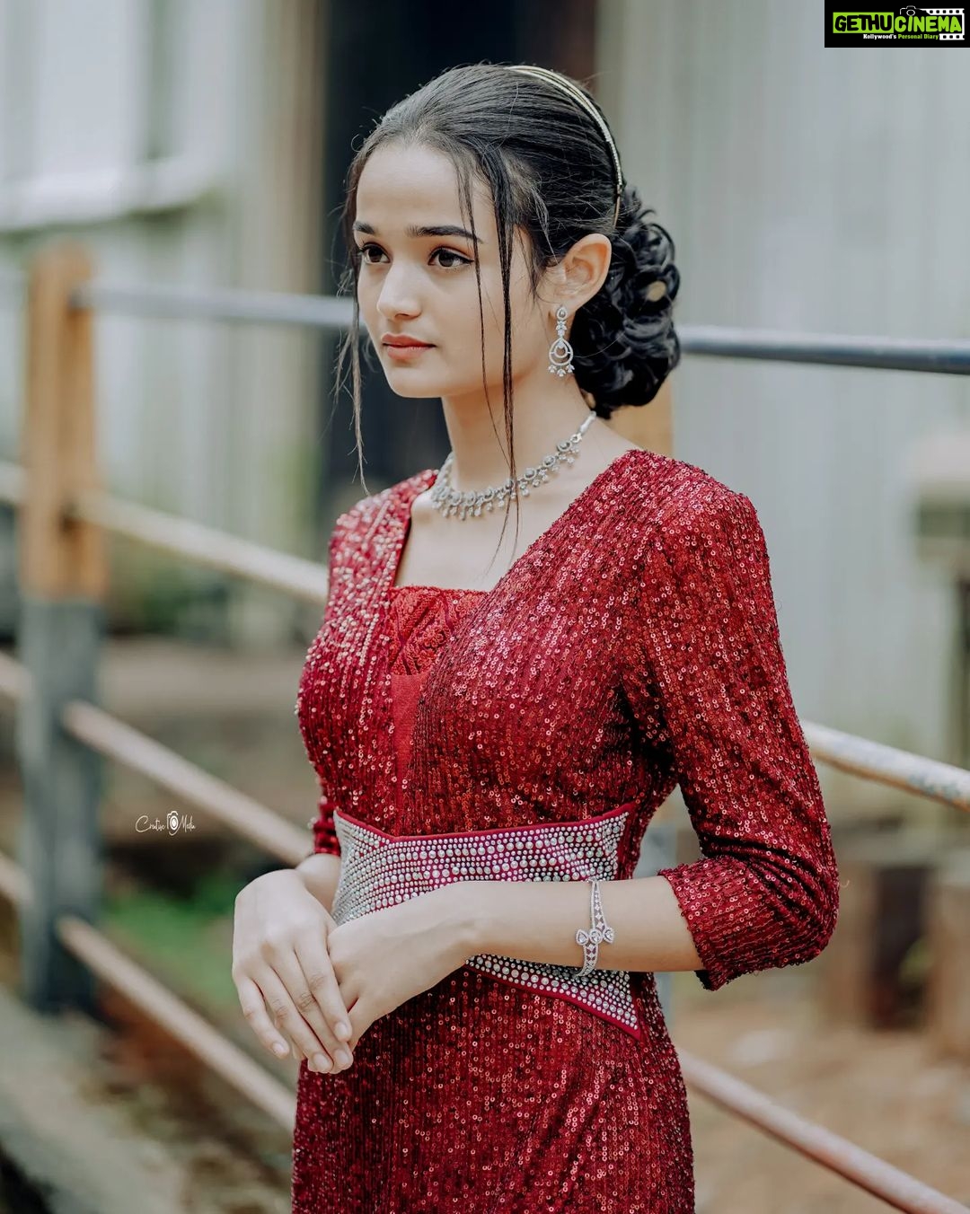 Meenakshi Anoop Instagram - Glimmer of red❤ Stylist and designer : @doms.2010 Costume: @western_lady_ Hair: @rathybaiju_mua jewellery: @anokhi_priyakishore Photography: @creative___media_ #style #happy #photo #life #nature #insta #cute #viral #likesforlike #model #music #travel #memes #explorepage #liker #girl #explore #selfie #india #beauty #k #lfl #trending #likeback #following #loveyourself #lifestyle #tiktok #photoshoot #photographer