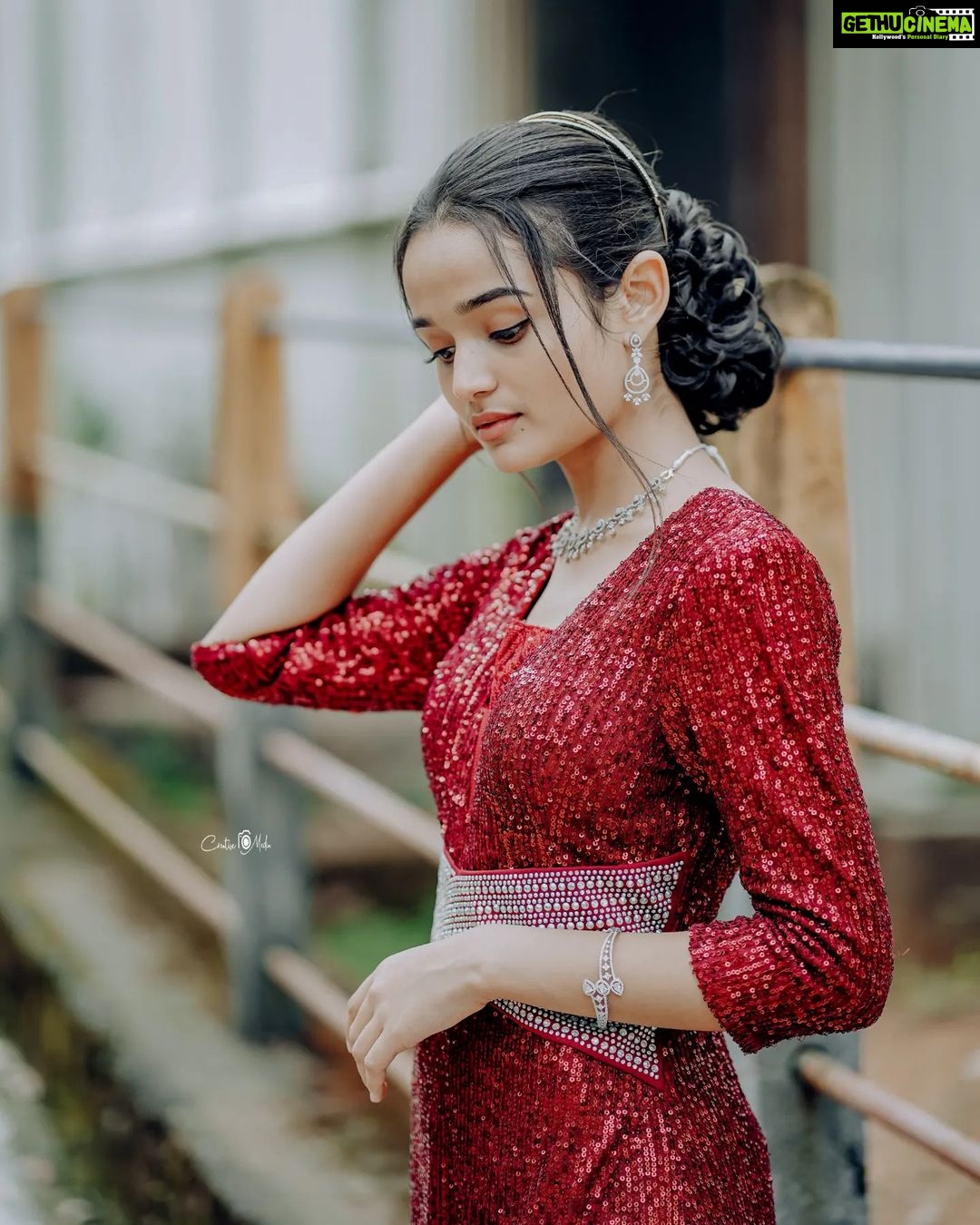 Meenakshi Anoop Instagram - Glimmer of red❤ Stylist and designer : @doms.2010 Costume: @western_lady_ Hair: @rathybaiju_mua jewellery: @anokhi_priyakishore Photography: @creative___media_ #style #happy #photo #life #nature #insta #cute #viral #likesforlike #model #music #travel #memes #explorepage #liker #girl #explore #selfie #india #beauty #k #lfl #trending #likeback #following #loveyourself #lifestyle #tiktok #photoshoot #photographer
