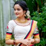 Meenakshi Anoop Instagram - Love the way 🦄 Stylist and designer : @doms.2010 Costume: @annmaria_boutique Jewellery: @anokhi_priyakishore Photography: @__purplemedia__
