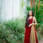 Meenakshi Anoop Instagram - Cherrish the moment 🍒 Stylist and designer : @doms.2010 Costume: @fingerprinz_bridal_hub jewellery:@anokhi_priyakishore Photography: @creative___media_